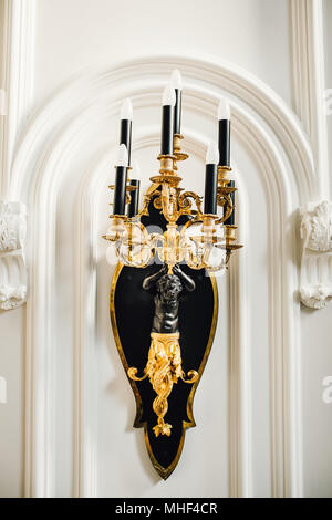 Luxurious Ornate Gold Wall Chandelier Stock Photo