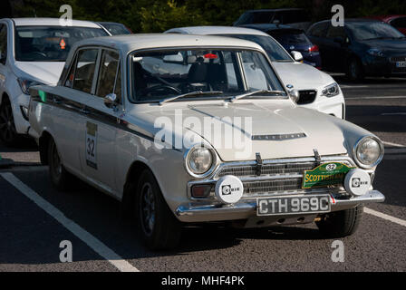 1965 White Ford Cortina GT Mark 1 Rally Car front right offside driver side view of white right hand drive four door british sport sports saloon car a Stock Photo