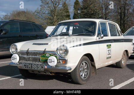 1965 White Ford Cortina GT Mark 1 Rally Car front nearside passenger side view of white right hand drive four door british sport sports saloon car aut Stock Photo