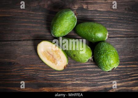 Feijoa on wooden background. Top view. Closeup Stock Photo