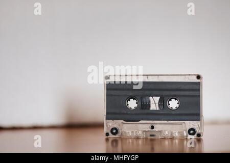 Cassette tape on a wooden desk Stock Photo