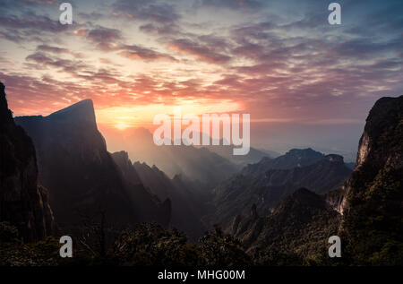 Artistic scenic view of Tianmen mountain landscape at sunset in Zhangjiajie, Hunan Province, China Stock Photo