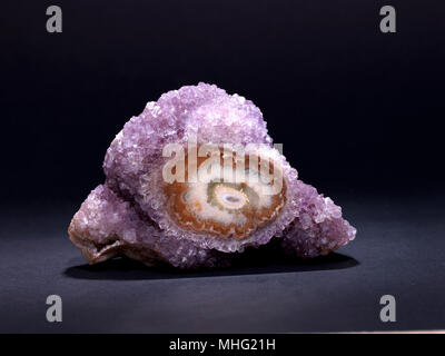 Amethyst crystal is believed by many to be one of relatively few gemstones with the specific purpose of improving intellectual and cerebral thought. Stock Photo