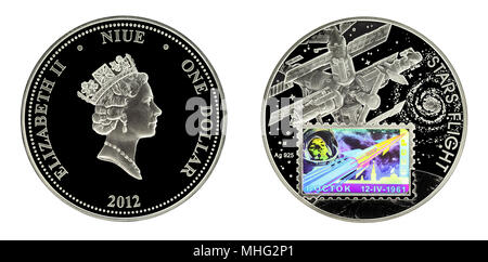 Investing silver coin Niue 1 dollar 2012 Stars Flight Space Hologram Gagarin Stamp Silver booklet Stock Photo