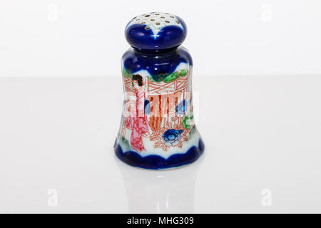 a blue hand painted scene on a salt shaker Stock Photo