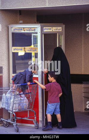 Saudi and foreign expatriates living and working in Saudi Aramco Dhahran oil company compound. Stock Photo