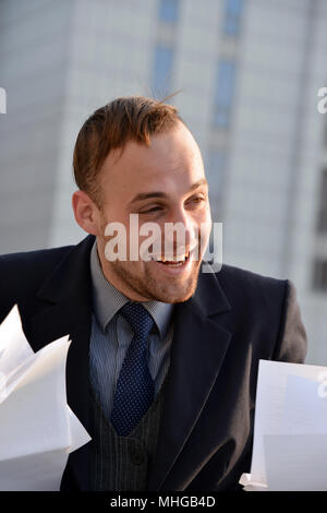 businessman emotionally reading documents Stock Photo