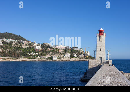 Nice city in France, pier with Phare de Nice lighthouse on Mediterranean Sea Stock Photo