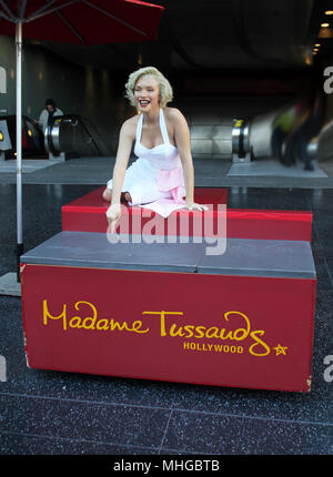 View on famous Marilyn Monroe celebrity waxwork body figure and her palm hands prints at Los Angeles at Walk of Fame Hollywood street. USA American mo Stock Photo