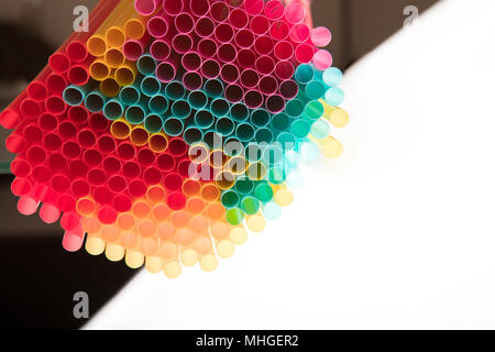 Top view of drinking straws on black and white background with copy space Stock Photo