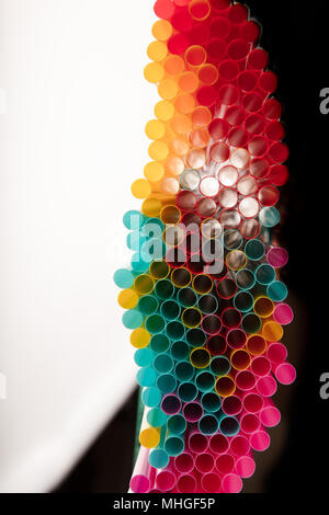Top view of drinking straws on black and white background with copy space Stock Photo
