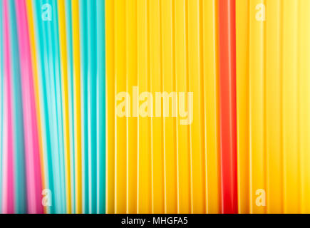 Colorful  straws art background. Abstract wallpaper of pastel colored straws. Rainbow colored colorful pattern texture. pastel straws. Stock Photo