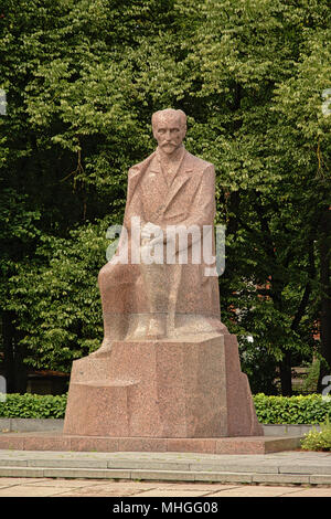 Marble sculpture of poet Rainis pseudonym for Jānis Pliekšāns, in a park in Riga Stock Photo