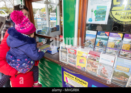 Windermere  UK 1st May  April  2018  Cumbria  Lake  Windermere Family from London get given free Lake Pounds which they spend on local Lake cruise Adela Urbina,Csaba Soos, &  3 year old Abergale . The Lake District Pound (LD£) is region’s new local currency . . Only local businesses can accept the LD£, so you know you’re supporting our communities.annual currency, new designs yearly.  pay,& you can y.   Every LD£ you collect helps  support local businesses, and fund local community & conservation projects through work of Cumbria Community Foundation Credit:Gordon Shoosmith/Alamy Live News Stock Photo