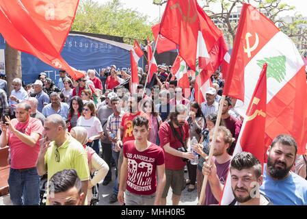 Beirut, Lebanon. 1st May, 2018. Protesters seen holding flags during the demonstration. Members of the Lebanese Communist Party and other worker rights groups march in Beirut in celebration of International Workers' Day. Credit: Antoine Abou-Diwan/SOPA Images/ZUMA Wire/Alamy Live News Stock Photo