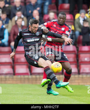 Fir Park, Motherwell, UK. 28th Apr, 2018. Scottish Premier League football, Motherwell versus Dundee; Ryan Bowman of Motherwell and Genseric Kusunga of Dundee Credit: Action Plus Sports/Alamy Live News Stock Photo