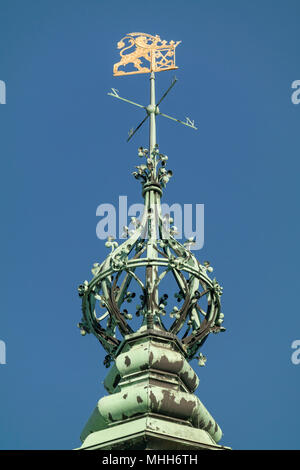 Spire with windvane and coat of arms on the tower of the City Hall Leiden Stock Photo