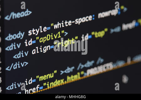 Real Html code developing screen. Programing workflow abstract algorithm concept. Lines of Html code visible. Stock Photo