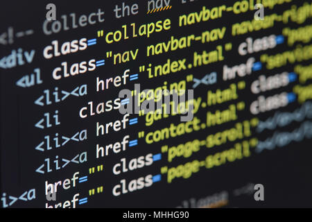 Real Html code developing screen. Programing workflow abstract algorithm concept. Lines of Html code visible. Stock Photo