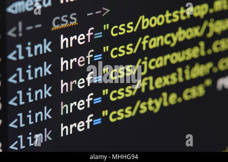 Real Html code developing screen. Programing workflow abstract algorithm concept. Lines of Html code visible. Stock Photo