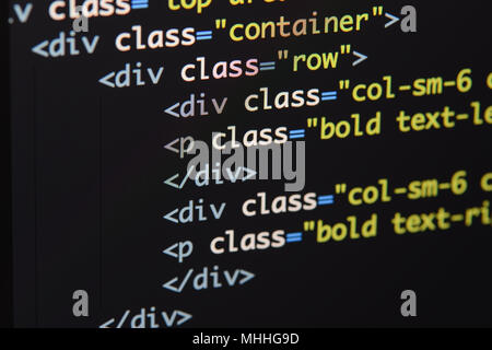 Real Html code developing screen. Programing workflow abstract algorithm concept. Lines of Html code visible. Stock Photo