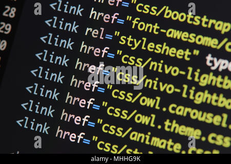 Real Html code developing screen. Programing workflow abstract algorithm concept. Lines of Html code visible. Stock Photo