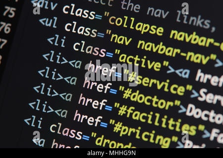 Real Html code developing screen. Programing workflow abstract algorithm concept. Lines of Html code visible. Stock Photo
