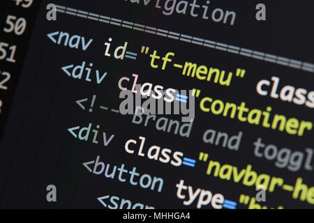 Real Html code developing screen. Programing workflow abstract algorithm concept. Lines of Html code visible. Stock Photo