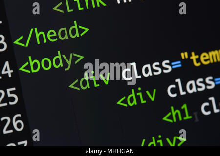 Real Html code developing screen. Programing workflow abstract algorithm concept. Lines of Html code visible. Stock Photo