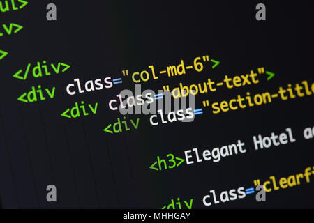 Real Html code developing screen. Programing workflow abstract algorithm concept. Lines of Html code visible. Stock Photo