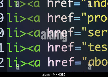 Real Html code developing screen. Programing workflow abstract algorithm concept. Lines of Html code visible. Stock Photo