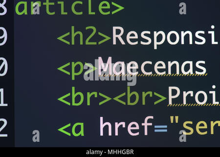 Real Html code developing screen. Programing workflow abstract algorithm concept. Lines of Html code visible. Stock Photo