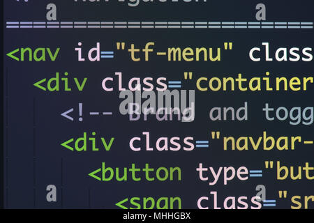Real Html code developing screen. Programing workflow abstract algorithm concept. Lines of Html code visible. Stock Photo