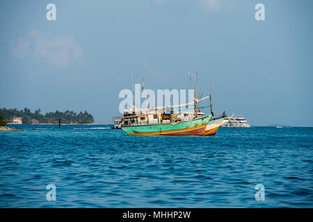 maldivian fishing boat in male maldives harbor Stock Photo