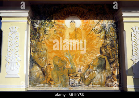 makulana temple pothubowa mawathagama north west province sri lanka Painting of the Life of Buddha On the base of large seated Buddha Stock Photo