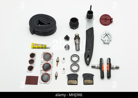Repairing of bicycle. Tools, parts and equipment set. Isolated on a white background. Stock Photo