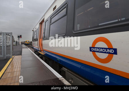 London Overground class 378 trains at  Clapham Junction, south london showing the overground logo Stock Photo
