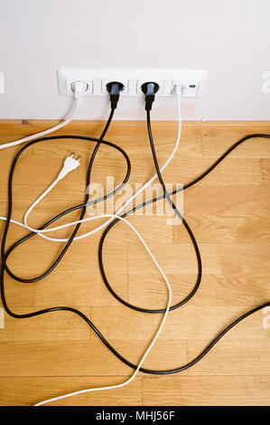 Electric and aerial outlet sockets, electric plugs and cables. Stock Photo