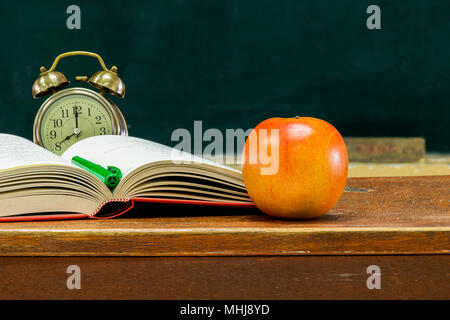 Blackboard is Empty, Education is important for everyone, because it helps to succeed. To stimulate teaching, Front side The book is stacked and has a Stock Photo