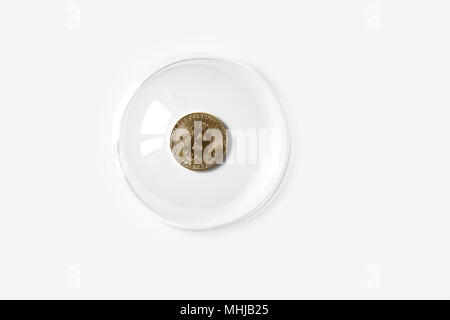 bitcoin cryptocurrency concept, physical coin inside a bubble on white background with copy space Stock Photo