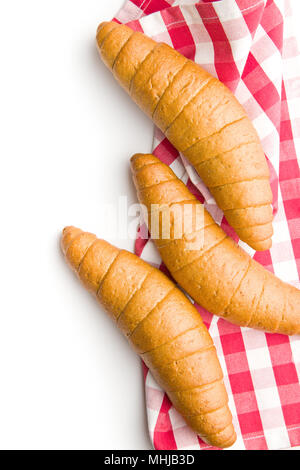 Salty bread rolls. Wholemeal croissants isolated on white background. Stock Photo