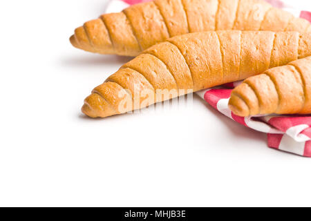 Salty bread rolls. Wholemeal croissants isolated on white background. Stock Photo