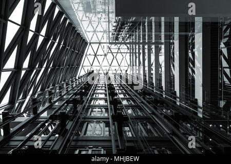 Modern steel construction background, abstract metal structure, black and white low angle high contrast picture Stock Photo