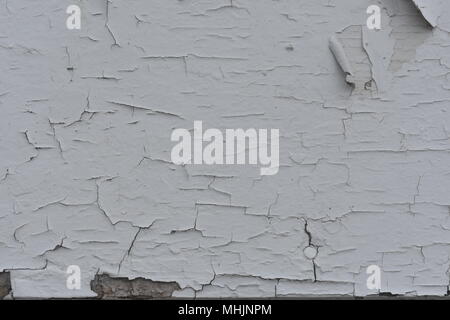Cracking and peeling white paint on an old church building in rural Missouri, MO, United States, US, USA. Stock Photo