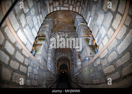 Paris Catacombs Skulls and bones walls detail Stock Photo