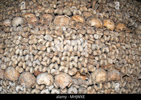 Paris Catacombs Skulls and bones walls detail Stock Photo