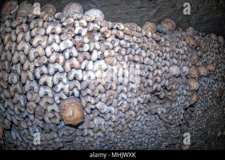 Paris Catacombs Skulls and bones walls detail Stock Photo