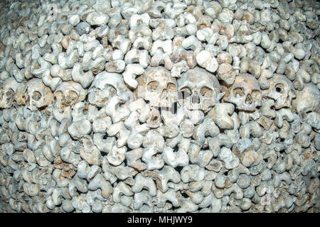 Paris Catacombs Skulls and bones walls detail Stock Photo