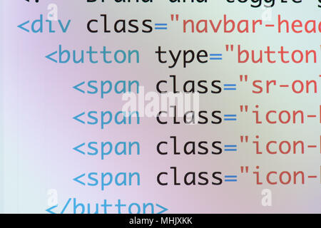 Real Html code developing screen. Programing workflow abstract algorithm concept. Lines of Html code visible. Stock Photo