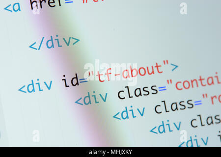 Real Html code developing screen. Programing workflow abstract algorithm concept. Lines of Html code visible. Stock Photo